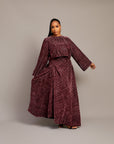 Elegant ruched maxi skirt and matching blouse in shimmering fabric.